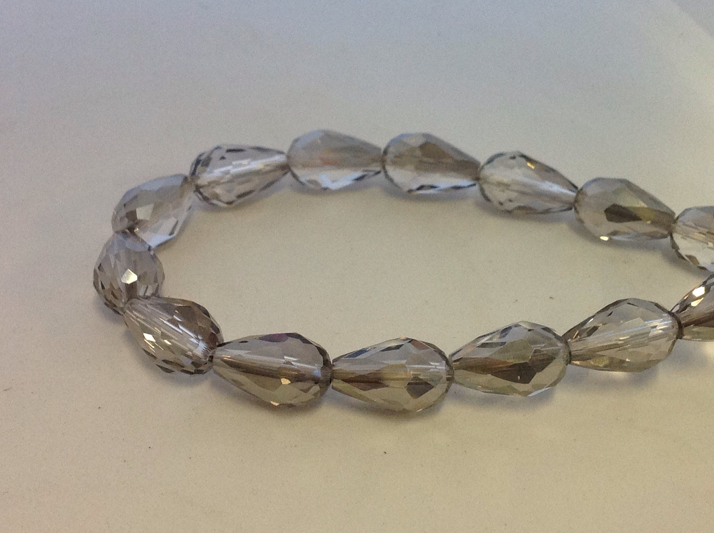 Faceted Glass drop bead, Smokey