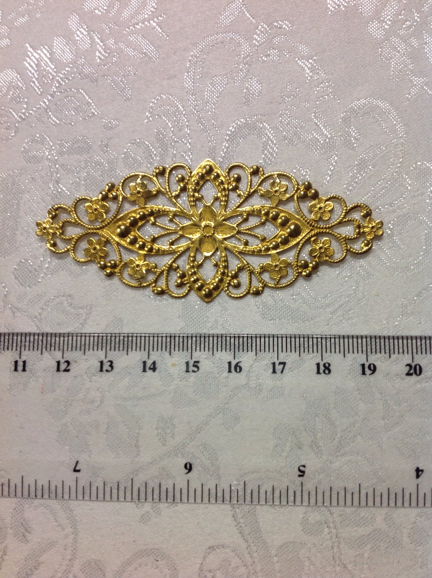 Metal stamping, large (4/0207)