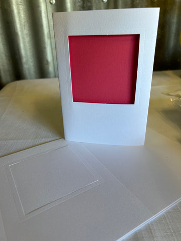 3 panel card with square aperture and embossed around frame