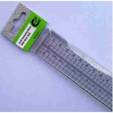 Centering ruler with stitch holes